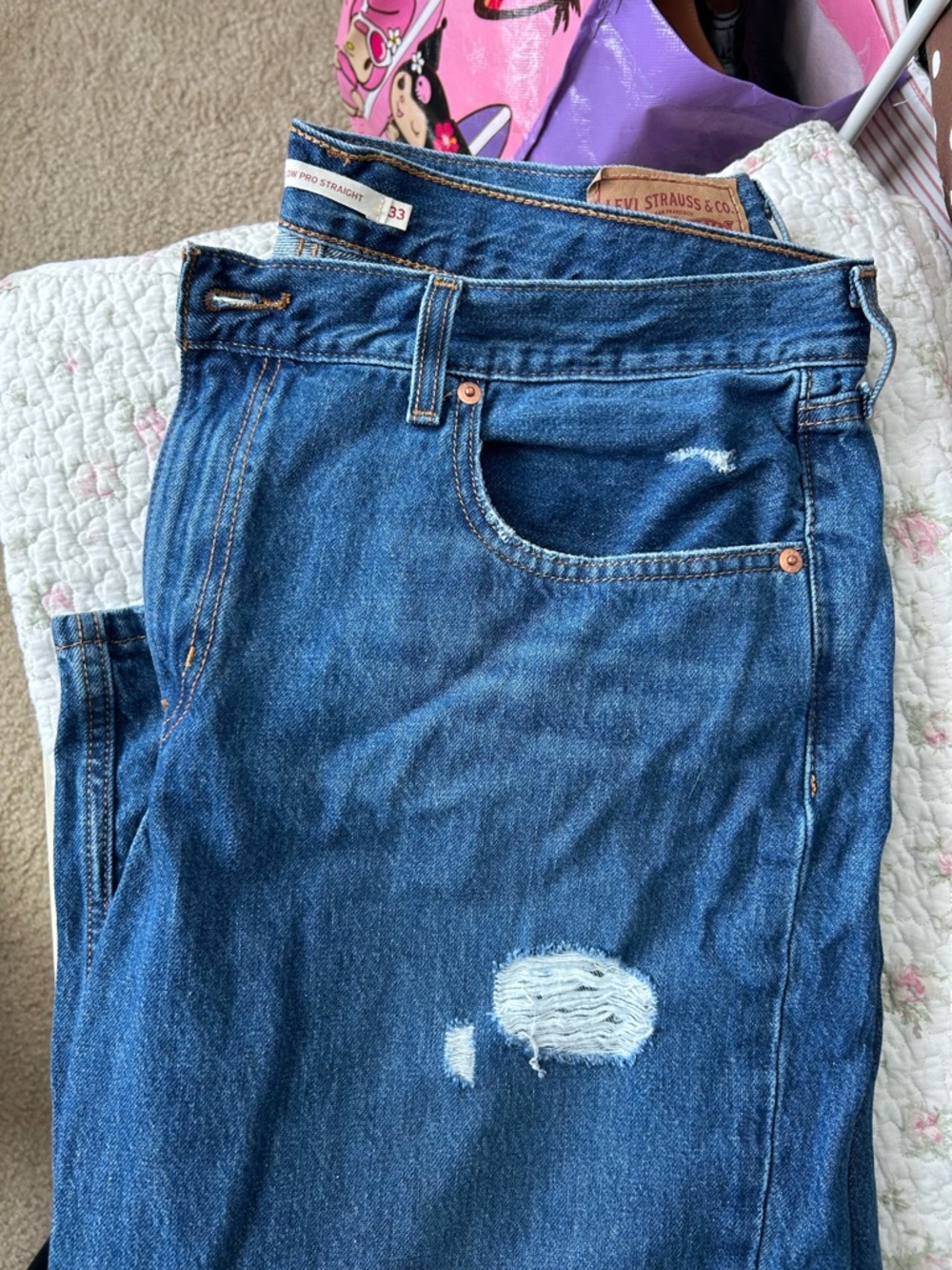 Levi's Women’s Medium Blue Straight Jeans with Distressed Detail